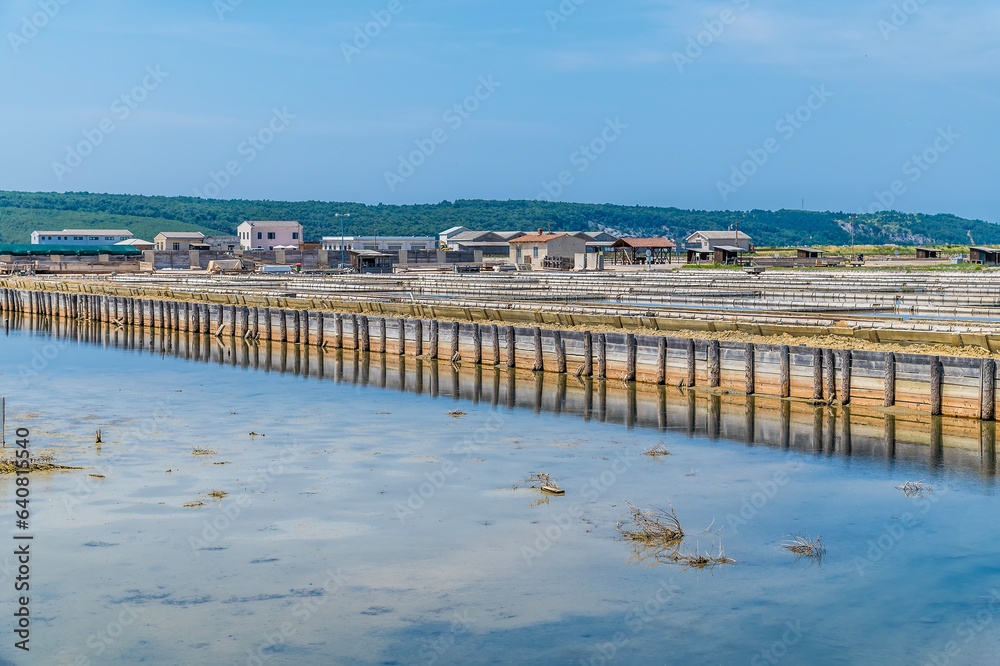 A view of bordered crystallisation pools at the salt pans at Secovlje, near to Piran, Slovenia in summertime