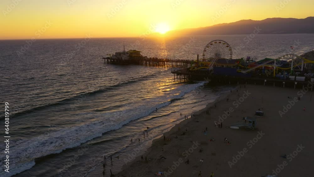 4K Aerial shot of the Santa Monica Pier during sunset in California USA 4K Aerial shot of the Santa Monica Pier during sunset in California USA