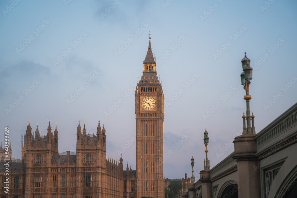 The Big Ben and Houses of Parliament against blue sky - London, UK.Tourist landmarks