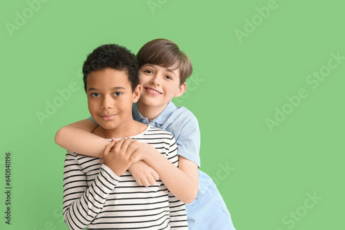 Cute little boys hugging on...