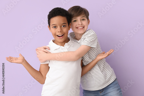 Cute little boys hugging on...