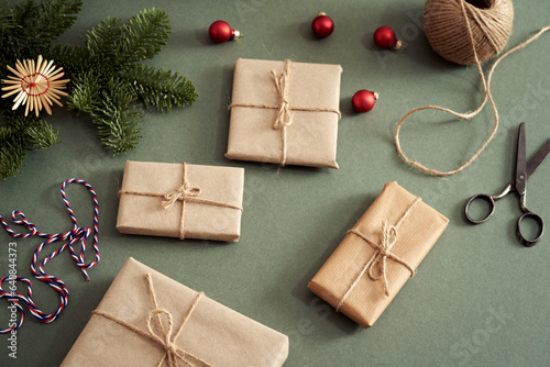Christmas presents wrapped in ecological recycled paper - zero-waste concept