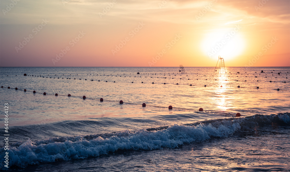 Naklejka premium evening sea beach with the swimming track dividers