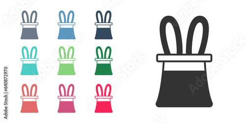 Black Magician hat and rabbit ears icon isolated on white background. Magic trick. Mystery entertainment concept. Set icons colorful. Vector