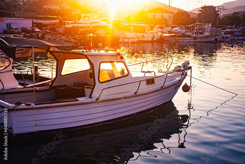 Schilderij op canvas Photograph of a fishing boat waiting moored in the harbor or on the shore