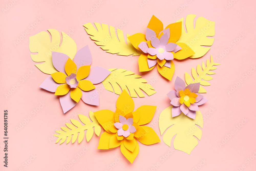 Obraz premium Colorful origami flowers with leaves on pink background