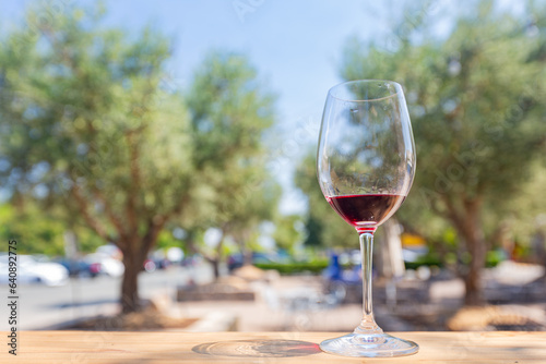 Close up shot of a glass of red wine