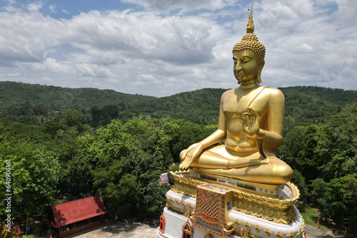 Luang Pho To  Wat Pha Thang  is a Buddha image enshrined outdoors in the Prathanphon posture. It is installed prominently and can be observed from a distance. It is believed that is very sacred. 