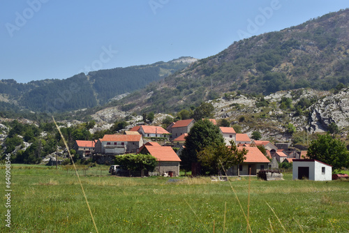 Small stone village in Montenegro. Old village on countryside of Njegusi, Montenegro. Rural scenery on a sunny day.