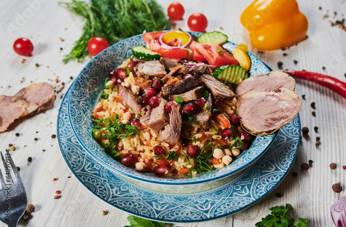 Rice pilaf with lamb meat and vegetables.