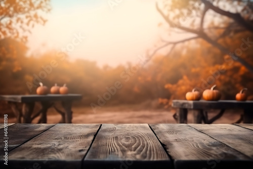 Wooden table with pumpkins, with Halloween background