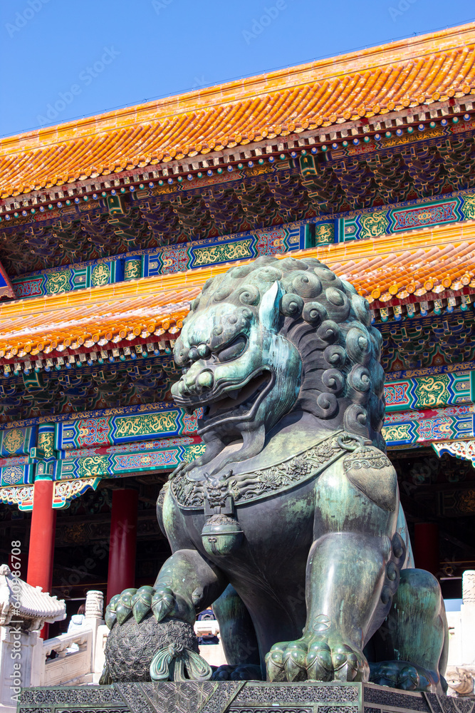 Vertical close up on the iconic bronze lion of The Forbidden City