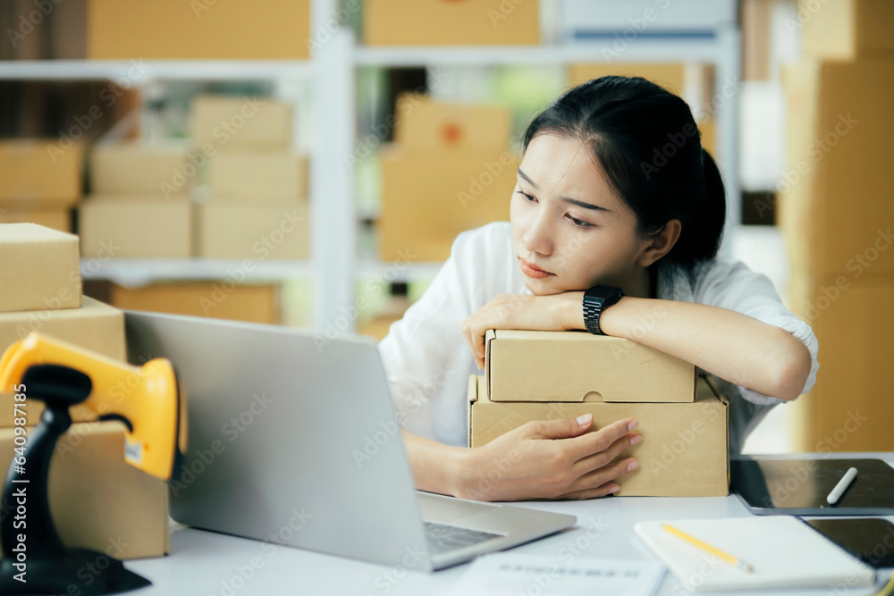 Online businesss owner tired and stress about business problem cannot sell. Online businesss owner tired and stress about business problem cannot sell.