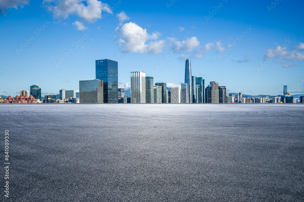 Asphalt road and city skyline with modern buildings scenery Asphalt road and city skyline with modern buildings scenery