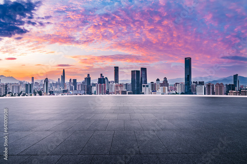 City square and skyline with modern buildings in Shenzhen at sunrise  Guangdong Province  China.