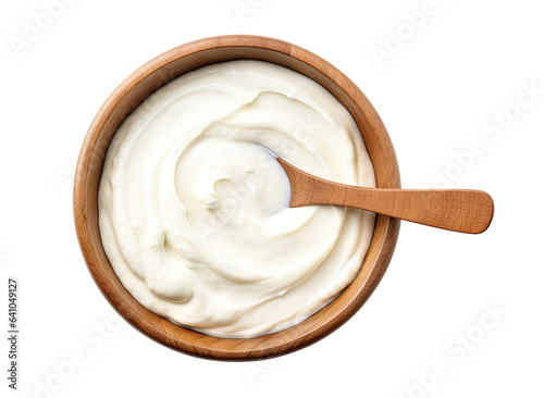 Wooden bowl with sour cream with spoon isolated on transparent background, top view