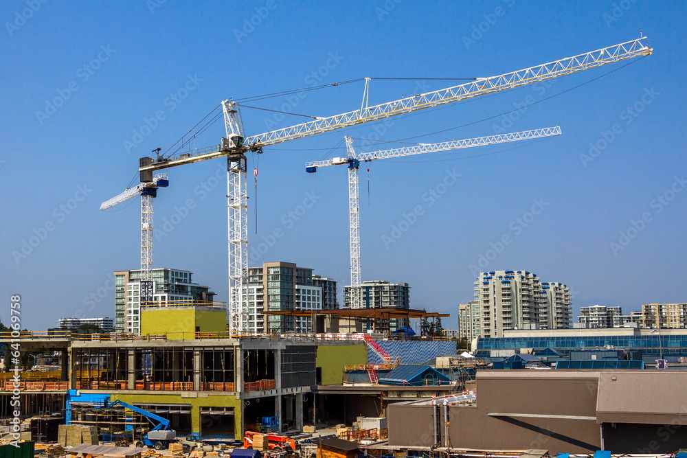 New construction of high-rise buildings in Richmond city, industrial construction site, construction equipment, construction crane and foundation pouring machine