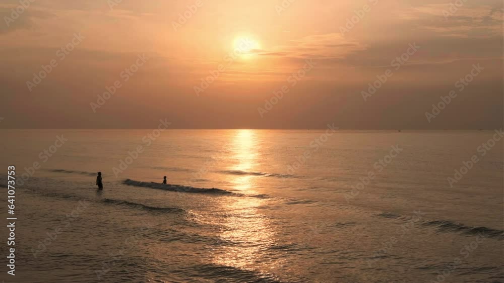 Wave splashing in sunrise or sunset on a tropical beach. Wave splashing in sunrise or sunset on a tropical beach.
