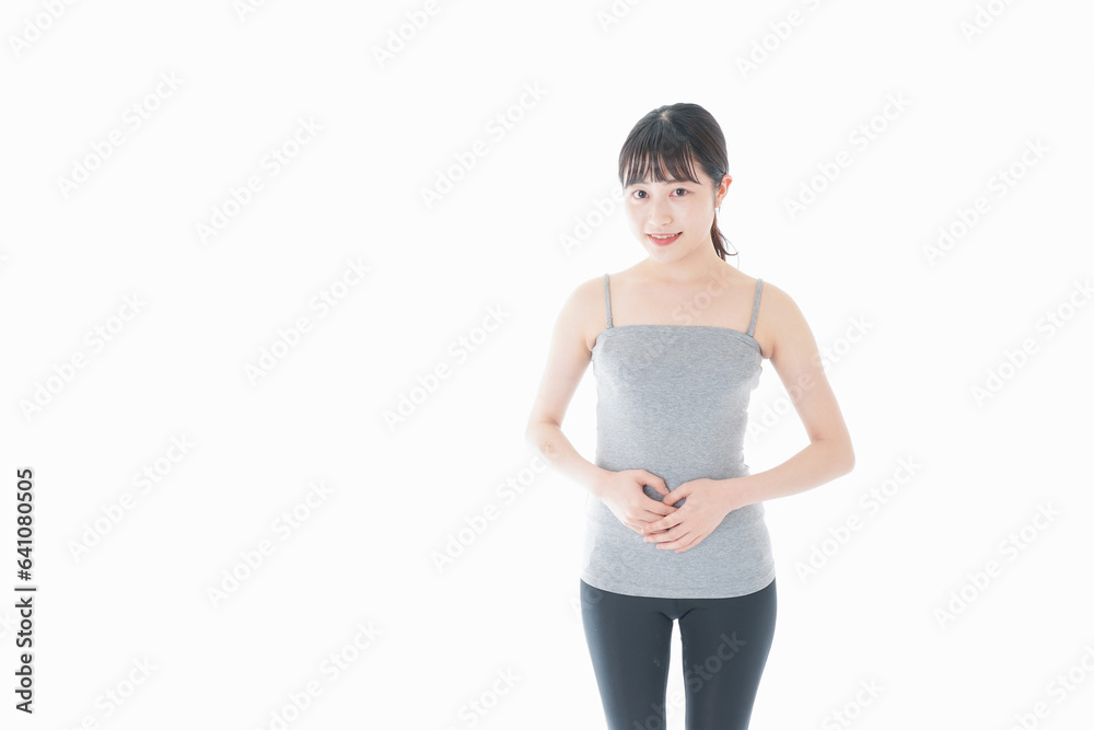 ダイエットをする若い女性 ダイエットをする若い女性