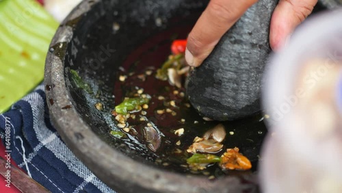 Established Shot of preparing Tahu Gejrot. Indonesian Traditional Street Food.  photo