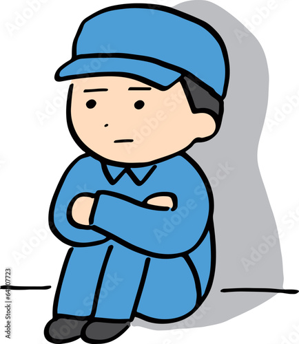暗い表情の作業服の男性