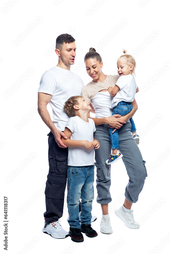 Happy family with children. Mom, dad, son and daughter are laughing and hugging. Love and tenderness. Isolated on white background. Full height. Vertical.