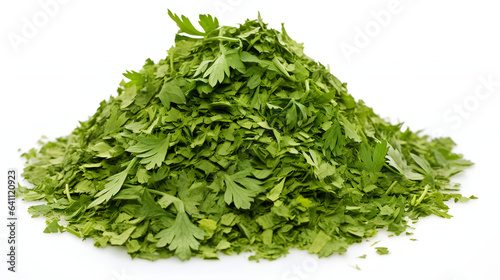 Chopped dry parsley leaves pile isolated on white background

