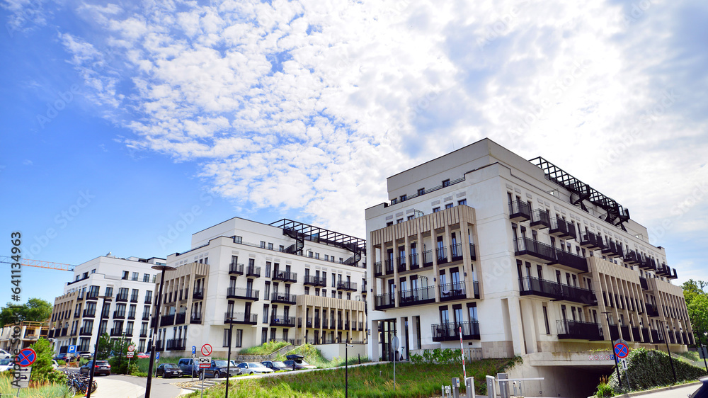 Low energy houses with apartments. Residential area with ecological and sustainable green residential buildings.