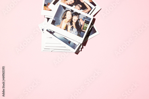 Collage of polaroids on pink background of 2 multiracial women having fun photo