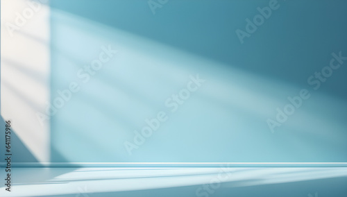 An original background image for design or product presentation  with a play of light and shadow  in light blue tones