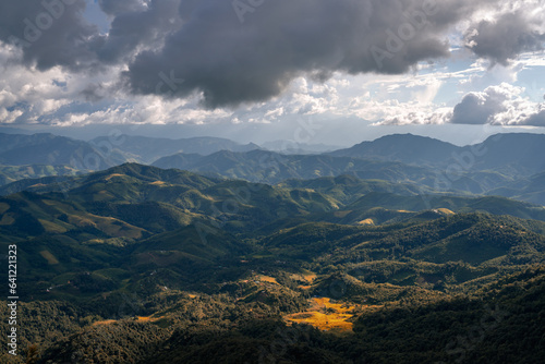 Beautiful mountain range view point with cumulonimbus cloud and storm in northern of Thailand (Tak province, Thailand)