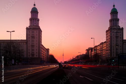 Berlin, Frankfurter Tor and tv tower at sunset photo