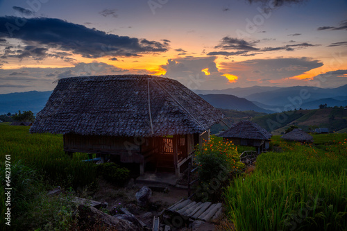 beautiful landscape bamboo hut on terraced green rice fields in cloudy day at twilight evening, ban pa pong pieng, Mae chaem, Chiang mai