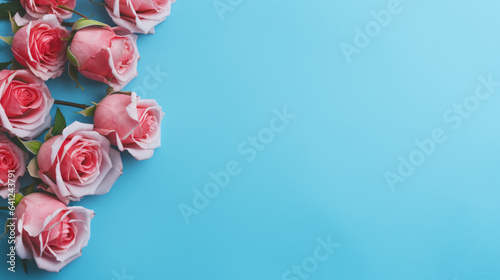Flowers composition. Rose flowers on blue background © khan
