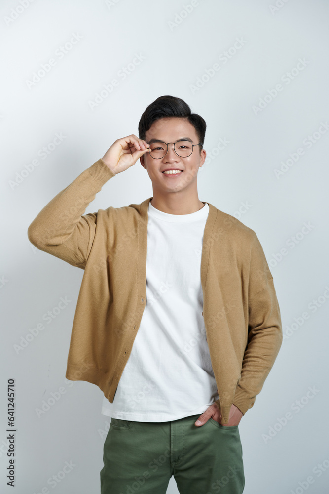 Photo of smart positive person arm touch adjust fixing eyewear isolated on red background Photo of smart positive person arm touch adjust fixing eyewear isolated on red background