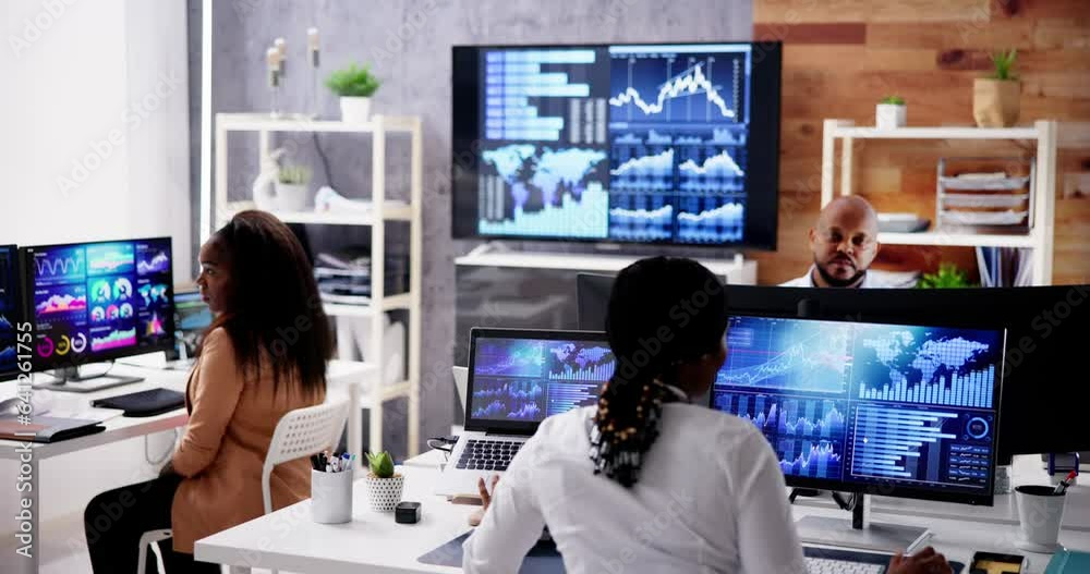 African Financial Data Analysts Using Dashboard On Screens African Financial Data Analysts Using Dashboard On Screens