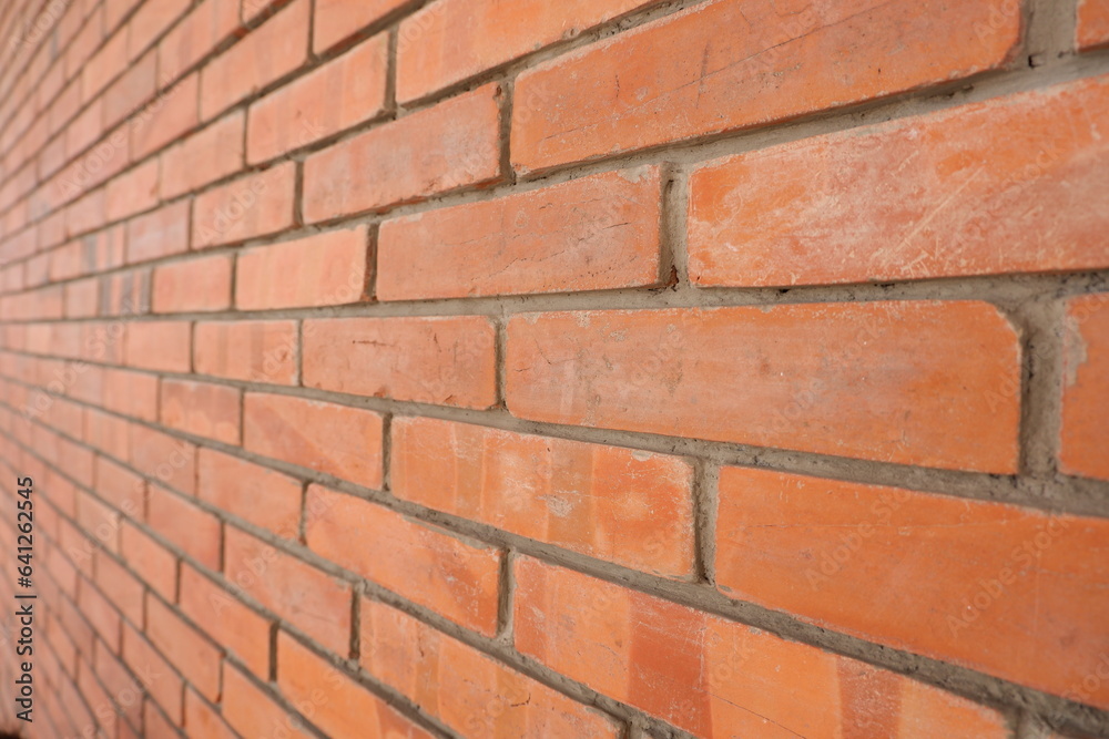 Obraz premium Close-up of an antique brick wall in a building