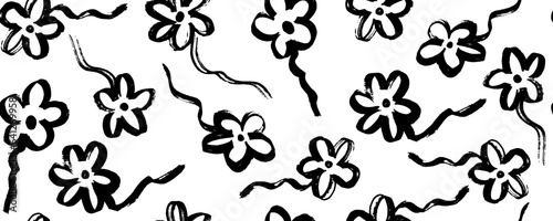 Trendy floral seamless pattern for fabric design. Flowers in Japanese style black and white texture. Summer vector illustration. Abstract grunge texture. Hand drawn brush pattern.