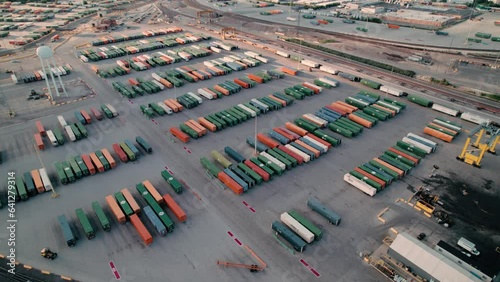 beautiful aerial of yard jockey truck driving with container in a Intermodal Terminal Rail road with yard full of containers. Northlake, Illinois, Union Pacific Railroad - Global II, Aerial photo