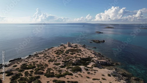 Aerial View Of Torre de ses Portes At Playa de ses Salines In Ibiza Island, Spain. photo