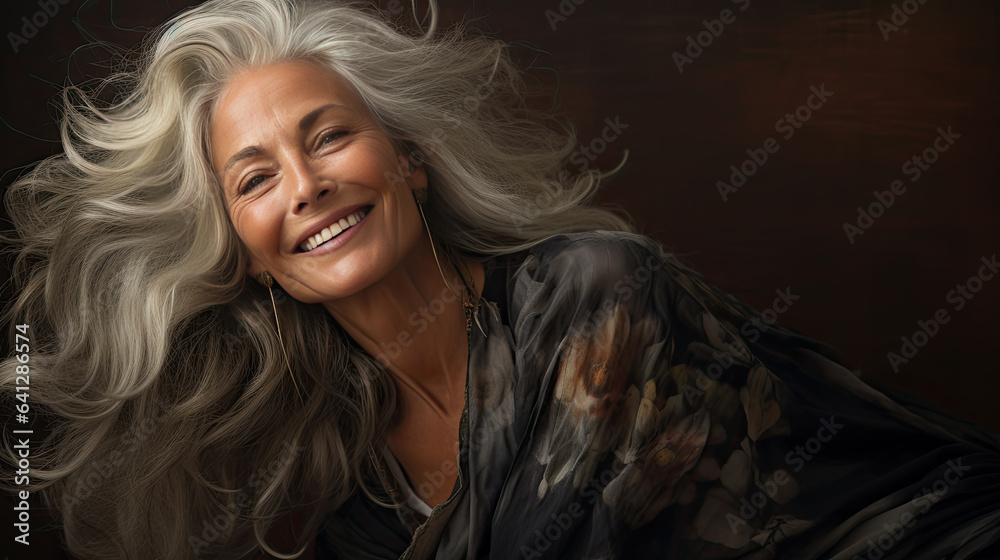 Portrait of a beautiful mature woman. With long white hair, she poses in a natural way. Portrait of a beautiful mature woman. With long white hair, she poses in a natural way.