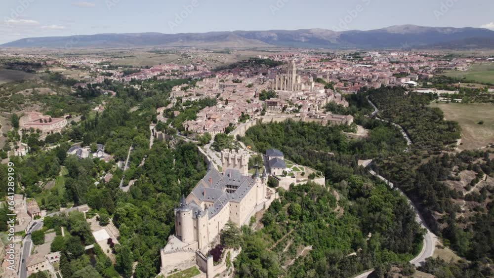 Striking aerial shot of medieval castle of Alcazar de Segovia in Spain Striking aerial shot of medieval castle of Alcazar de Segovia in Spain