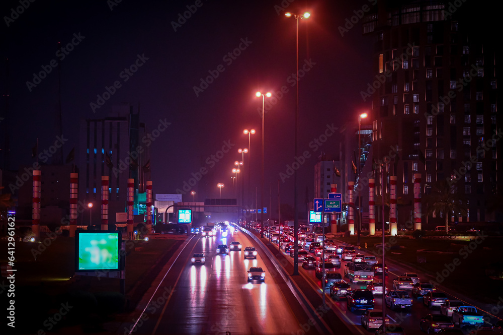 Night traffic on the road in Riyadh, Saudi Arabia. Night traffic. Night traffic on the road in Riyadh, Saudi Arabia. Night traffic.