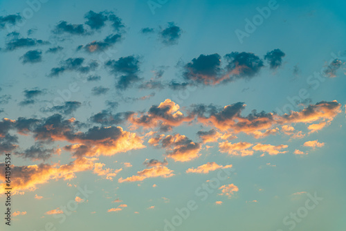 Clouds at sunrise, bright colorful sunrise. The bottom of the clouds are bright and the top is dark