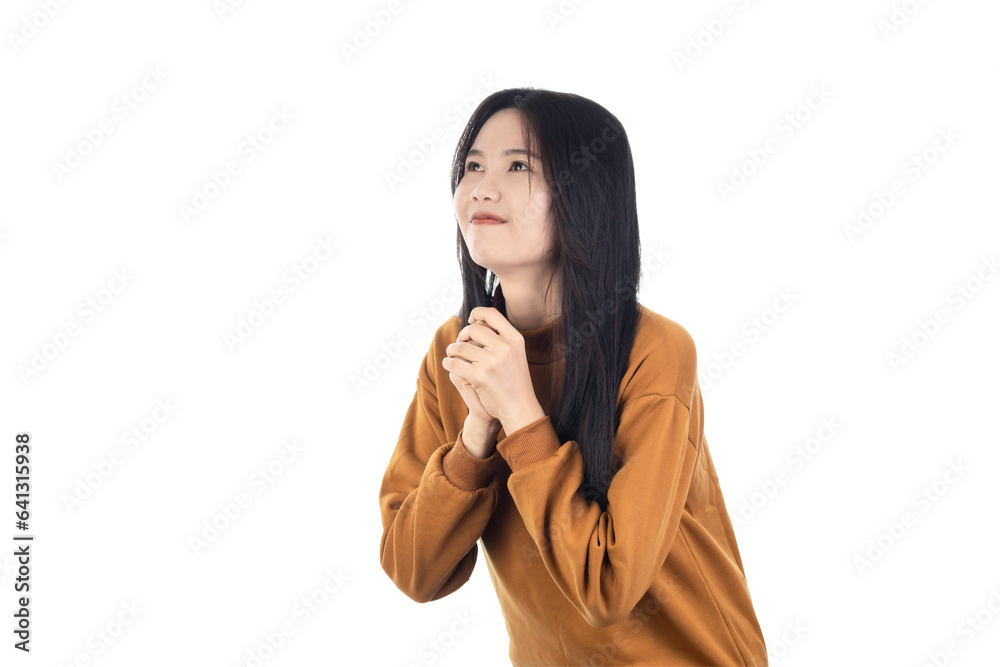 Young Asian woman holding hands in prayer, asking for help, expressing gratitude isolated on white background with clipping path. Young Asian woman holding hands in prayer, asking for help, expressing gratitude isolated on white background with clipping path.