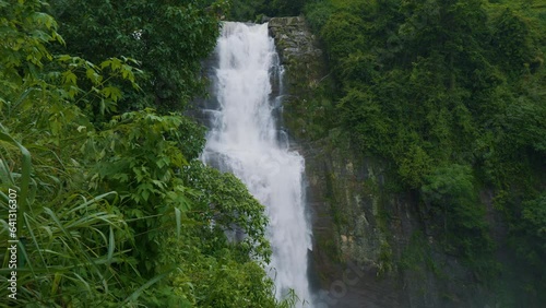 Ramboda Falls. Sri Lanka. Powerful stream of water in rocky mountains. photo