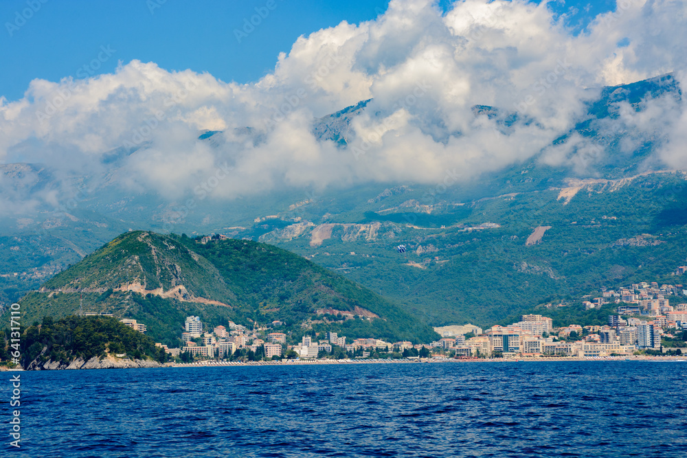 Mountain coast near the sea In Montenegro. Thick clouds in the sky.