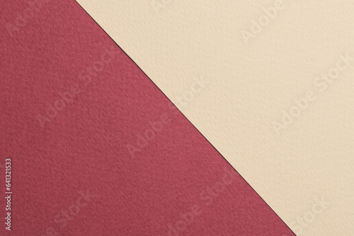 Rough kraft paper background, paper texture red burgundy beige colors. Mockup with copy space for text.