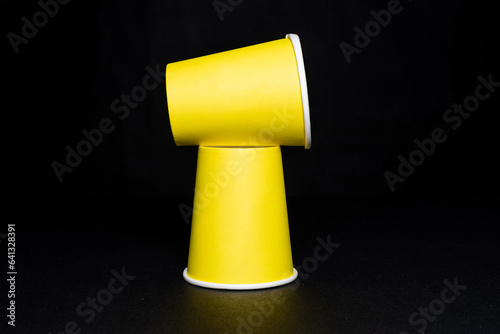 Yellow Paper cups, Papercups on black background (ID: 641328391)