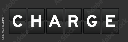 Black color analog flip board with word charge on gray background
